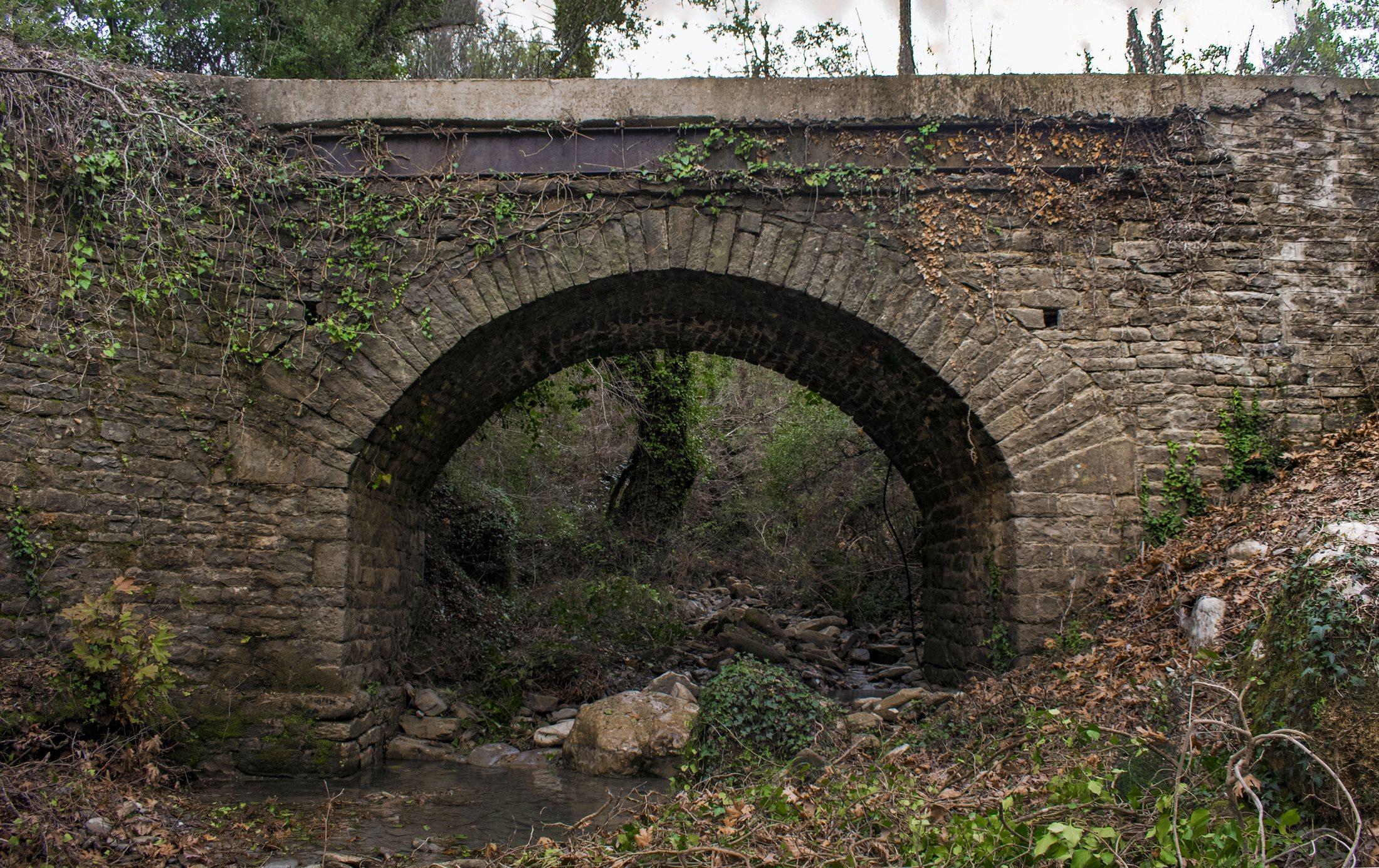 Old stone bridge and stream corridor in the heritage landscape